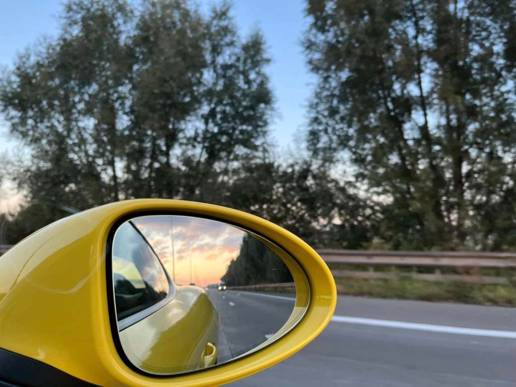 Road Trip view in the Sports Car Mirror